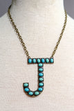 Blaze Initial Necklace in Bronze